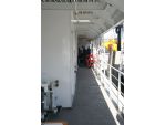 Starboard side upper deck passageway looking forward from the stern.